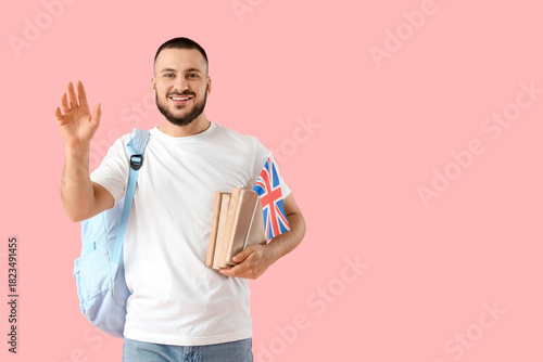 Young happy man with backpa...