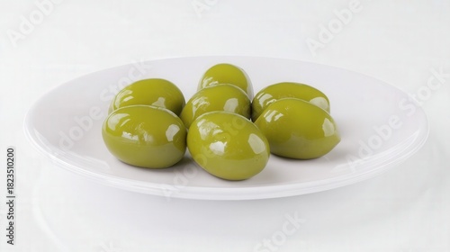 Fresh green olives on white plate isolated. Generative AI