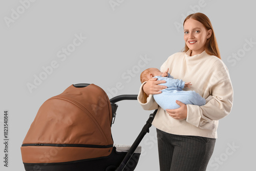 Young mother with her littl...