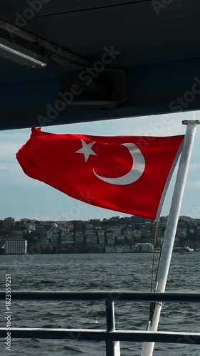 The Turkish flag on a sea vessel.
A strong wind flutters the Turkish national flag.
Epic slow-motion shot of the Turkish flag on a ferry.