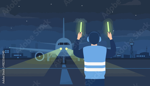 Airport ground crew guiding an airplane on a runway at night with illuminated handheld lights.