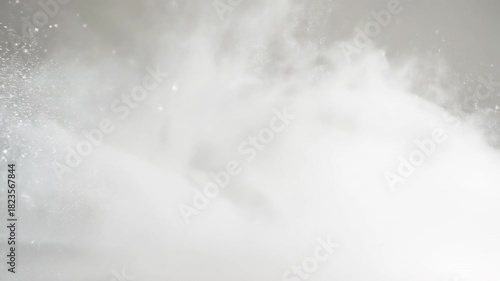 Wallpaper Mural ﻿A seamless abstract loop of ethereal white dust particles flowing across a minimalist blank space, representing potential and clarity background, clean slate, modern Torontodigital.ca