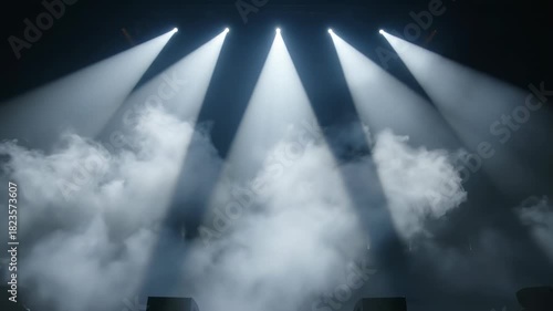 Powerful focused white spotlights cutting through heavy theatrical smoke and appearing suspended in the dense atmospheric air mystery, conceptual, fog