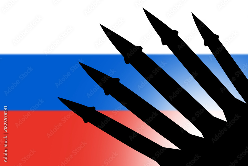 Obraz premium Silhouette of rockets against Russia flag background. Symbol of military power.