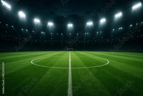 Empty illuminated football stadium under night sky showing green grass field, central circle, and goalpost in perspective. Ai generative. Ai generative
