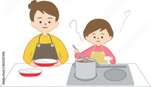 女の子と一緒に料理をする女性