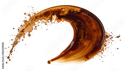 Splashed dark brown liquid in a curved wave shape against a black background