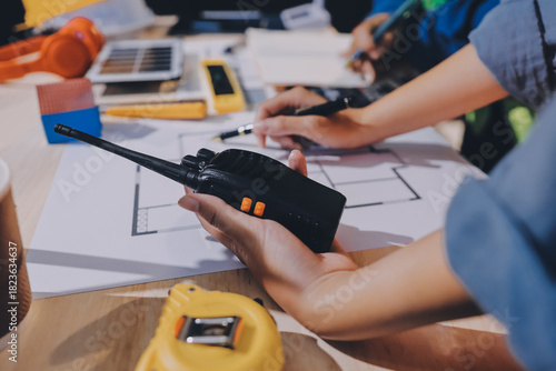 Wallpaper Mural Architects and engineers working collaboratively on construction project Torontodigital.ca