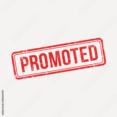 Red grunge rubber stamp impression with the word PROMOTED isolated on a plain background.