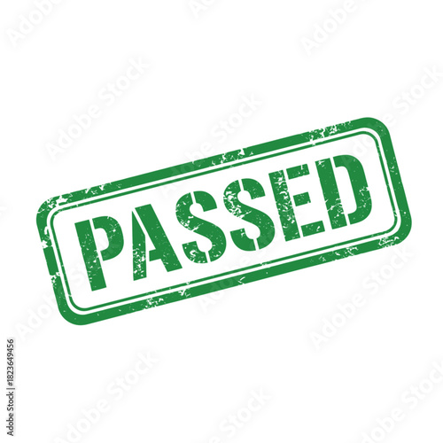 Green rubber stamp with the word PASSED, indicating successful completion or approval.