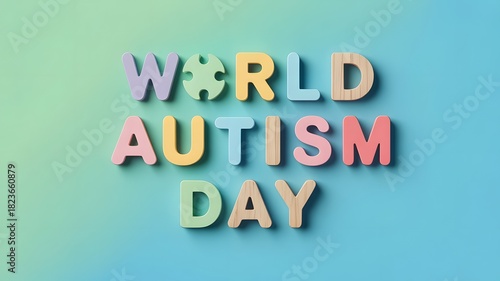 World Autism Day Awareness Concept with Pastel Puzzle Pieces on Mint Green Background