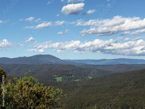 Mountain range forest and weather clouds