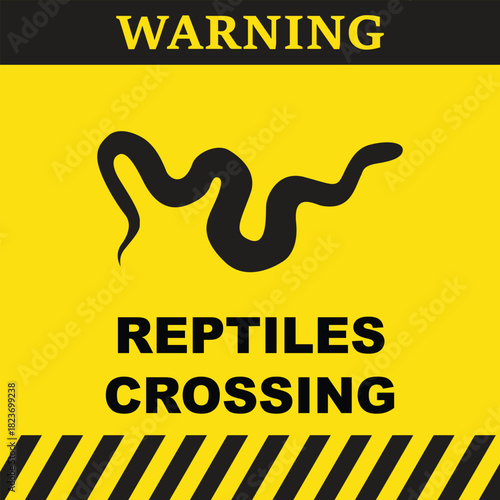 Warning symbol with silhouette of a snake and the text reptiles crossing