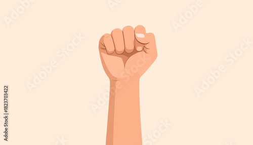 A light-skinned human hand clenched into a fist, raised upwards against a plain light background, symbolizing strength or protest.