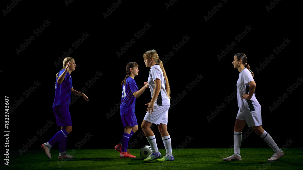 Fototapeta premium Young soccer players coordinating midfield play during possession. Concept of tactical instruction, controlled buildup teaching, coaching diagrams, structured sports lessons.