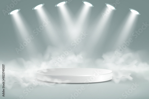 White round podium with bright spotlights and soft fog on light background