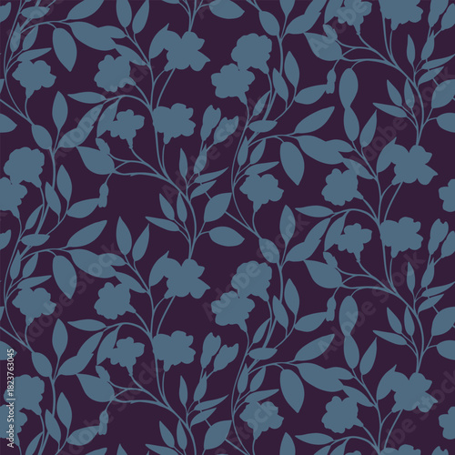 Seamless vector floral pattern with muted blue flower and leaf silhouettes on a deep plum background. Elegant, moody botanical design for textiles, packaging, and modern decor