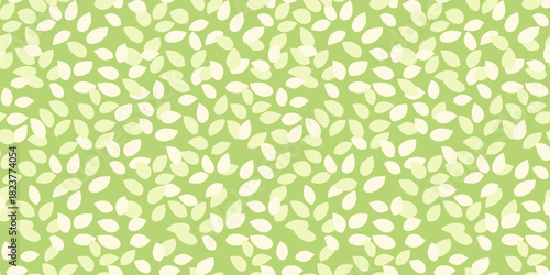 Seamless vector pattern featuring scattered light and dark green leaves on a soft green background. Eco friendly designs for  textiles, wallpapers, packaging, and organic branding