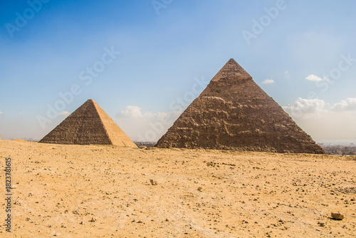 Egypt Antiquities, Archeology photography, Great Pyramid of Giza, Cheops Pyramid, Photo is selective focus with shallow depth of field. New angle panorama view shot, Taken Cairo Egypt on 25 Nov 2025