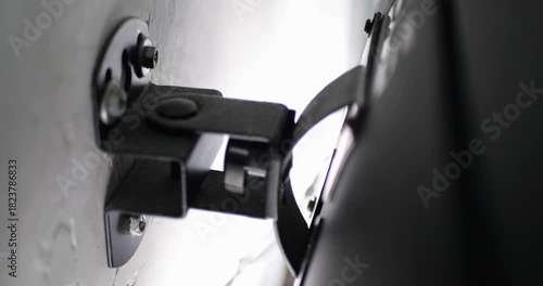 Monitor Bracket Close Up Adjusting Viewing Angle. Ergonomic Workspace Setup, Modern Office. Engineering, Productivity, Home Office, Workplace Comfort, Technology, Professional Solution