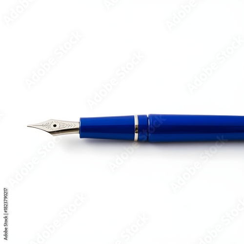 A sleek blue fountain pen with a metallic nib and intricately designed clip lies horizontally on a crisp white background