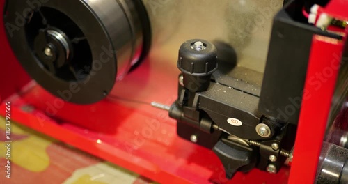 Welding Wire Feed Mechanism Close Up In Automatic MIG Welder Slow Consistent Wire Feeding Industrial Equipment Repair Factory Maintenance DIY Metalworking Professional Tools Mechanical Engineering