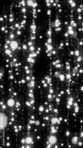 Countless ethereal white particles, sparkling and soft, gently drifting downwards in an infinite black void, glowing with subtle luminescence, cinematic tranquil wonder atmosphere