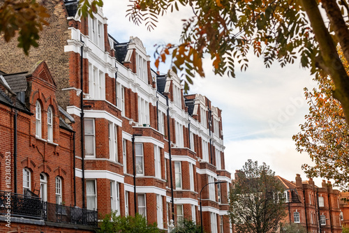 Wallpaper Mural Elegant Victorian terraced houses under blue sky, Kensington London Torontodigital.ca