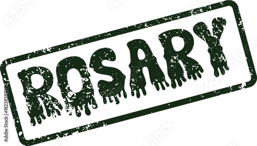 Distressed green rubber stamp bearing the devotional word Rosary on a clear surface for religious communication