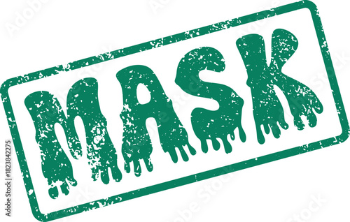 Grungy green rubber stamp impression displaying the word MASK with dripping ink texture