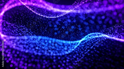 Abstract blue and purple particles in motion with swirling, dynamic shapes