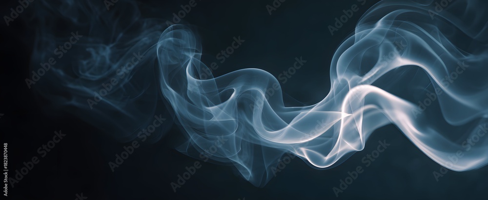 Fototapeta premium The slowly swirling smoke dances like ghostly ribbons against a dark canvas.