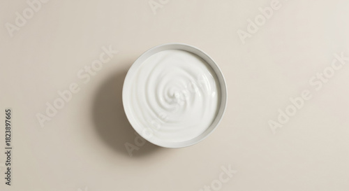 Minimal Overhead View of Yogurt in White Bowl