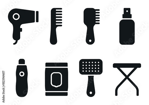 Silhouettes of hair styling tools on dark background