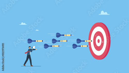 Businessman control dart to reach perfect target bullseye. Marketing target strategy, leadership or skill to reach target or achievement, aiming for perfection winning, challenge or accuracy.