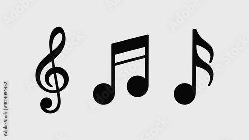 Three music notes in black on a white background including a treble clef and eighth note symbols shown