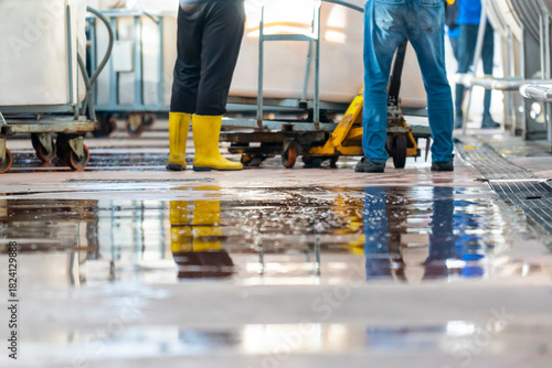 Close up view of a wet floor in an industrial laundry.