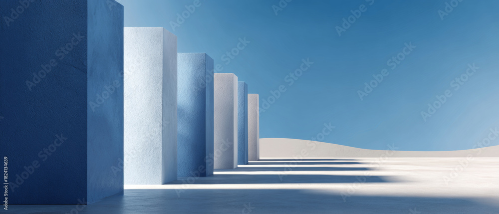Fototapeta premium Minimalist architectural scene with tall rectangular pillars casting long shadows on smooth ground under clear blue sky