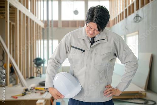 つらそうな作業員