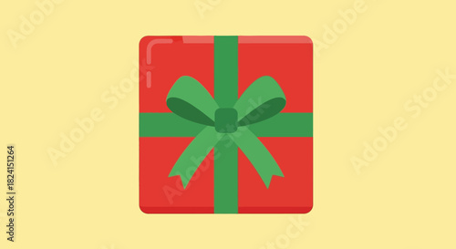Top view of a red square gift box with a green ribbon and bow