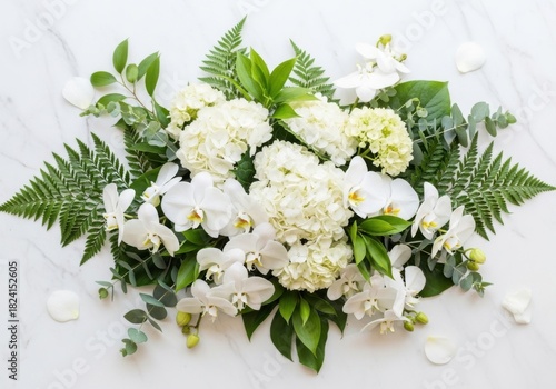 Elegant white and green floral arrangement with hydrangeas and orchids