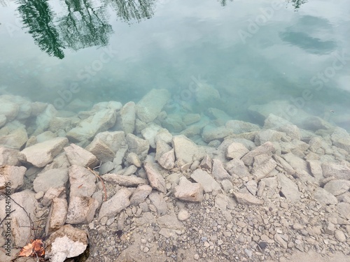 Lake Thun in Switzerland, the largest lake in the Bernese Oberland region, has crystal clear waters that allow you to see the rocks.