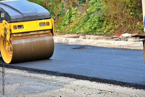 repairing asphalt road, municipal theme