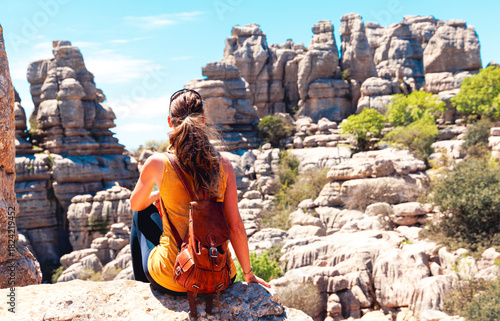 Woman traveler enjoying view of Torcal, Antequera, province of Malaga in Spain