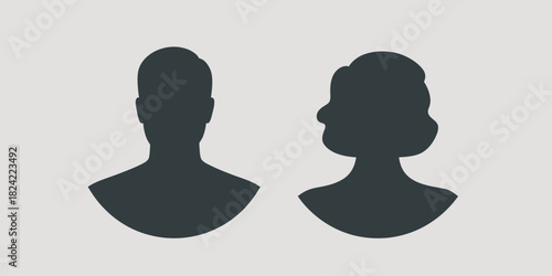 Silhouette of a man and a woman facing each other on a neutral background