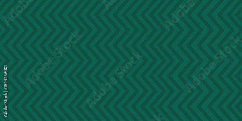 Seamless zigzag striped pattern on dark green background. Ideal for Christmas themed textiles, wrapping papers and fabric design