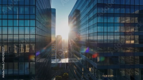 Sunlight Shining Through Modern Glass Skyscrapers in a Cityscape architecture