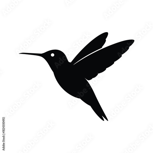 Silhouette of a hummingbird in flight against a white background