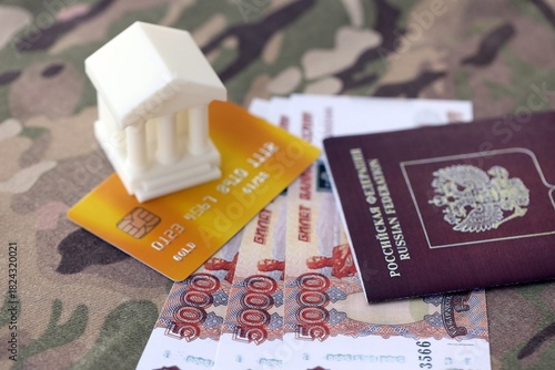 Photography Russian rubles money bills and bank with credit card and passport close up