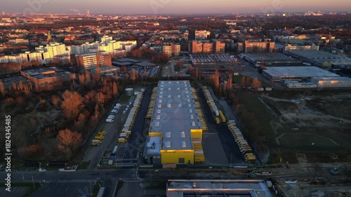Long yellow DHL distribution center Berlin. Nice aerial view flight drone
